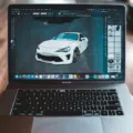 Ilustrasi laptop yang membuka software desain gratis untuk membuat grafis media sosial